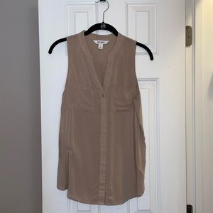 Tan sleeveless blouse